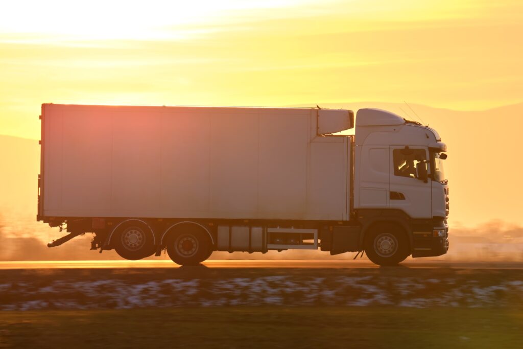 cargo truck driving on highway hauling goods in ev 2026 03 16 02 12 35 utc